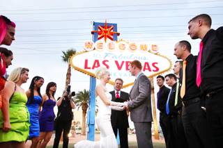 Ashley Hankinson and Jeremy Hankinson of Brantford, Ontario, wed at the Welcome to Fabulous Las Vegas sign on Friday, Nov. 11, 2011.