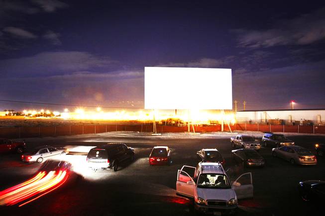 Cars pull in to watch a movie at the West Wind Drive-In movie theatre in North Las Vegas Friday November 11, 2011.