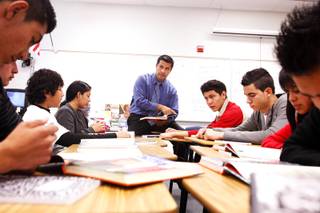 Edgar Acosta teaches English as a second language at Western High School on Tuesday, Nov. 15, 2011.