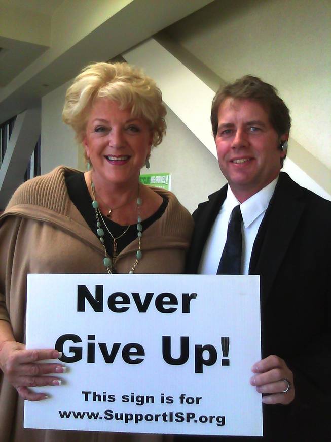 Las Vegas Mayor Carolyn Goodman poses with Matthew Dovel, president of International Suicide Prevention, a nonprofit group that offers counseling services, as well as suicide scene cleanups.