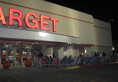A crowd of shoppers waits outside of Target, 605 N. Stephanie St., on Nov. 24, 2011, hours before the midnight opening for Black Friday deals.
