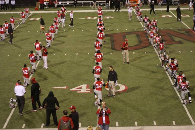 Rebel players warm up before their game against San Diego State on Saturday, Nov. 26, 2011, at Sam Boyd Stadium.
