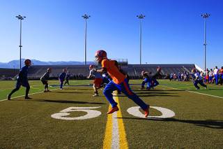 Bishop Gorman players practice at Damonte Ranch High School Friday, Dec. 2, 2011 before their state championship game against Reed High School on Saturday.