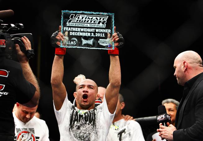 Featherweight fighter Diego Brandao celebrates after defeating Dennis Bermudez at the TUF 14 Finale in the Palms December 3, 2011.
