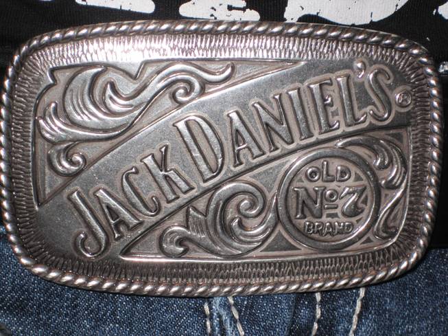 Brittany Pittman's belt buckle touts the Jack Daniel's brand.