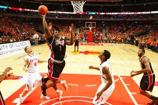 UNLV forward Quintrell Thomas drives to the basket against Illinois Saturday, Dec. 17, 2011 at the United Center in Chicago. Thomas had 13 points in the Rebels 64-48 defeat of 19th ranked Illinois.