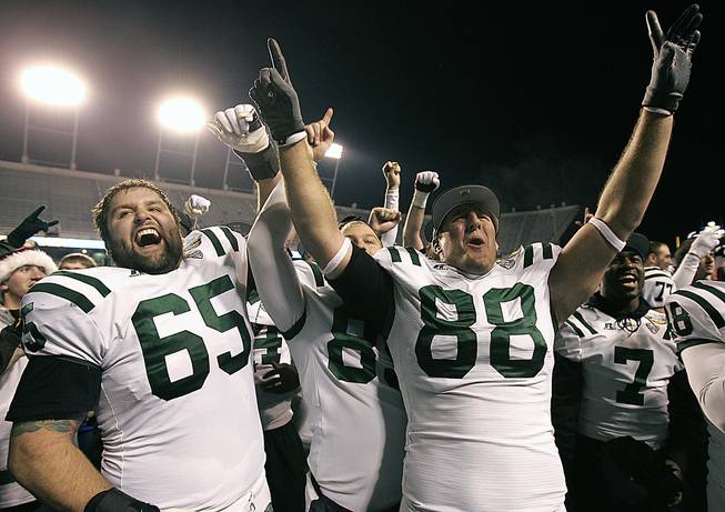 Ohio's Skyler Allen (65) and Jordan Thompson (88) celebrate after defeating Utah State in the Famous Idaho Potato Bowl NCAA college football game on Saturday, Dec. 17, 2011, in Boise, Idaho