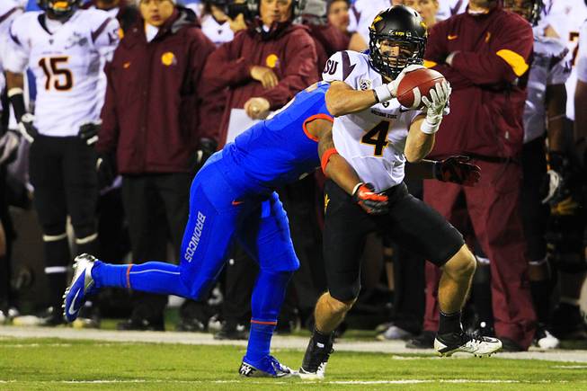 Arizona State wide receiver Aaron Pflugrad pulls in a pass ...