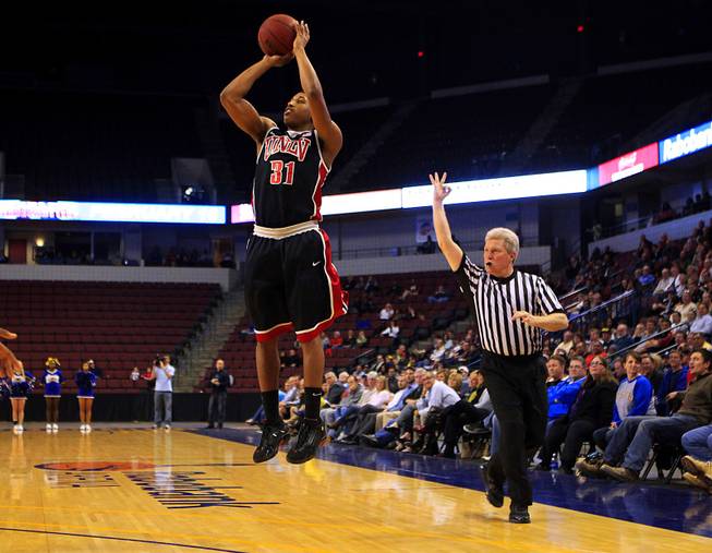 UNLV guard Justin Hawkins takes a three point shot against Cal State-Bakersfield during their game Thursday, Jan. 5, 2012 at Rabobank Arena in Bakersfield. UNLV won their final non-conference game 89-57. Hawkins was 4 for 7 from three point range and finished with 17 points.