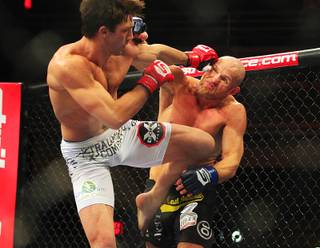 Middleweight champion Luke Rockhold and Keith Jardine trade blows during their match at Saturday, Jan. 7, 2012 at the Hard Rock. Rockhold retained his belt with a first round TKO.