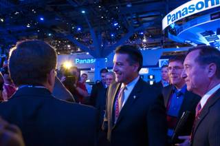 Nevada Governor Brian Sandoval takes a tour of the Consumer Electronics Show, Wed. Jan 11, 2012.