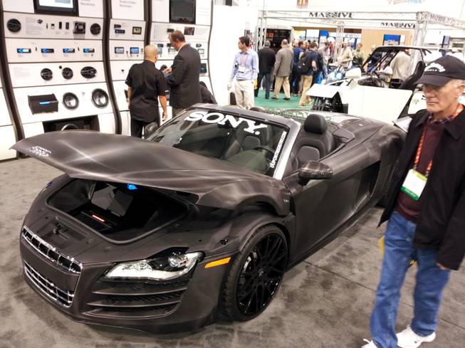 Exhibitors at the 2012 CES often use cars to showcase products.  In some cases, the car is the product.  These cars are scattered across the exhibit floor, but they all have one thing in common, Luxury.