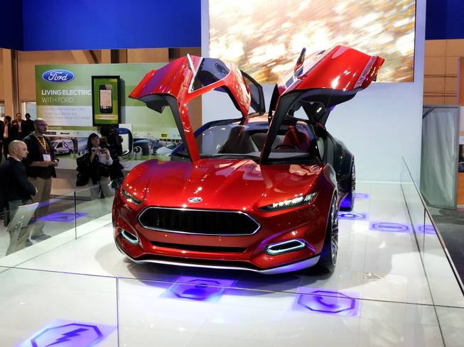 Ford's EVOS concept car sports doors that swing up.