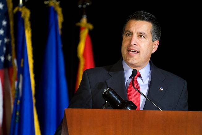 Nevada Governor Brian Sandoval speaks during a welcome home ceremony for the 422nd Expeditionary Signal Battalion at the Mandalay Bay Sunday, January 15, 2012. The Army National Guard soldiers entered field service on January 7, 2011 and have been serving in Afghanistan since March 28, 2011.