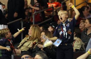 Ken Haley, 8, gives his all while cheering on the Wranglers on Saturday night as Las Vegas hosted the Ontario Reign for a second night at the Orleans Arena. Local Boy Scouts were recognized on the ice Saturday night for their popcorn sales throughout the past year; hundreds of scouts were in attendance.
