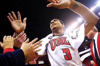 UNLV guard Anthony Marshall greets fans after the Rebels dispatched TCU 101-78 during their Mountain West Conference game Wednesday, Jan. 18, 2012 at the Thomas & Mack Center.
