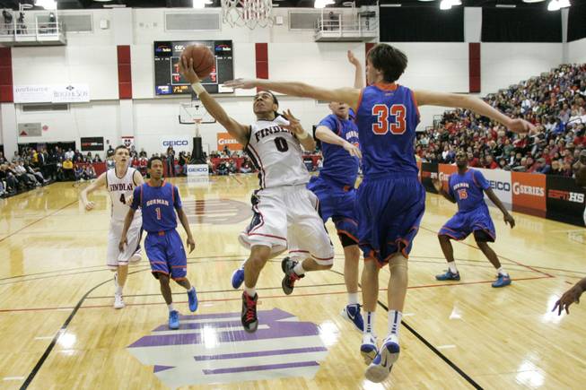 Findlay Prep guard Nigel Williams-Goss drives to the basket while being defended by Bishop Gorman center Stephen Zimmerman during their game Saturday, Jan. 21, 2012 at Cox Pavilion. Findlay won the game 73-61.