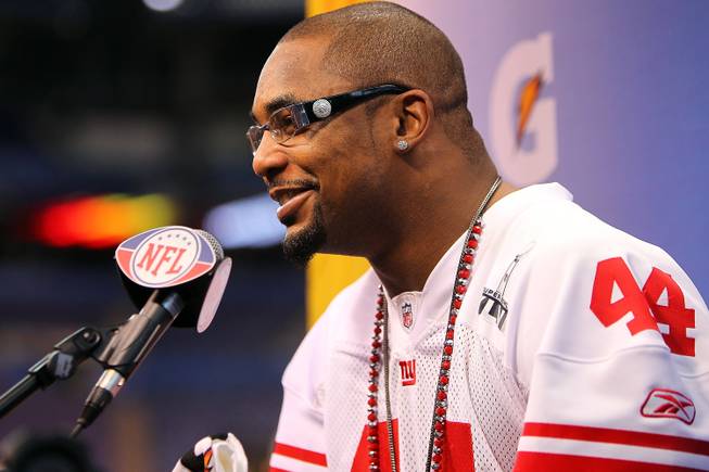 New York Giants running back Ahmad Bradshaw talks to to the media at Super Bowl 46 Media Day in Indianapolis. 
