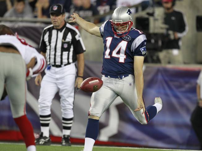 New England Patriots punter Zoltan Mesko punts against the New York Giants during the second quarter of a preseason NFL football game in Foxborough, Mass., Thursday, Sept. 1, 2011.)
