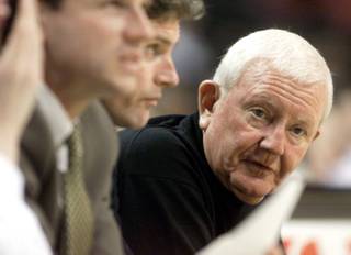 Former UNLV head basketball coach Charlie Spoonhour looks down the bench during the first round NIT tournament game against Arizona State on March 12, 2002.