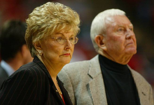 UNLV president Carol Harter stand next to UNLV basketball coach Charlie Spoonhour before the start of the Rebels game against New Mexico on January 31, 2004 