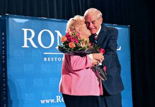 Republican presidential candidate U.S. Rep Ron Paul (R-TX) gets a kiss from his wife Carolyn during a campaign event at the Four Seasons Las Vegas Wednesday, February 1, 2012. It is their 55th wedding anniversary today.