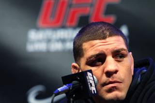 Nick Diaz  listens to a question during a news conference in advance of UFC 143 Thursday, Feb. 2, 2012 at Mandalay Bay.