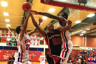 Valley High School's Hasaan Henderson drives to the basket against  Las Vegas High school during their game Friday, Feb. 3, 2012 at Valley.