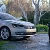 In this file screen shot provided by Volkswagen of America, a child actor portraying Darth Vader, uses the Force on a 2012 Volkswagen Passat, in a 2011 Super Bowl ad. Volkswagen charmed millions of viewers last year with a "Star Wars"-themed ad introducing its redesigned 2012 Passat sedan that showed a little boy in a Darth Vader costume trying to use "The Force" on different objects.