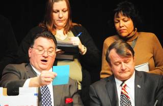 Clark County Republican Party officials and voters count ballots during a special 