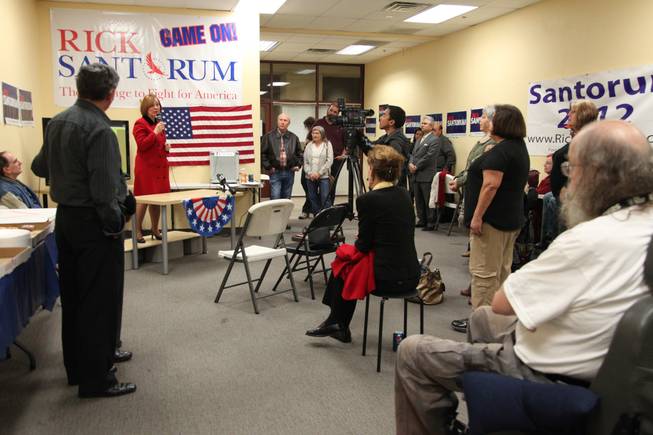Sharron Angle speaks to a thin group of Rick Santorum supporters at Santorum's campaign headquarters in Las Vegas Friday night. Angle endorsed Santorum on Wednesday.