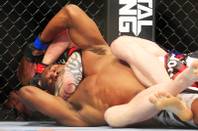 Clifford Starks finds himself in a rear naked choke from Ed Herman in the second round of their fight at UFC 143 Saturday, Feb. 4, 2012 at the Mandalay Bay Events Center.