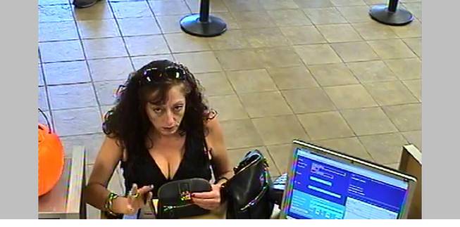 Another photo of the woman wanted by Henderson Police for using assumed identities to withdraw money from several banks in the city.