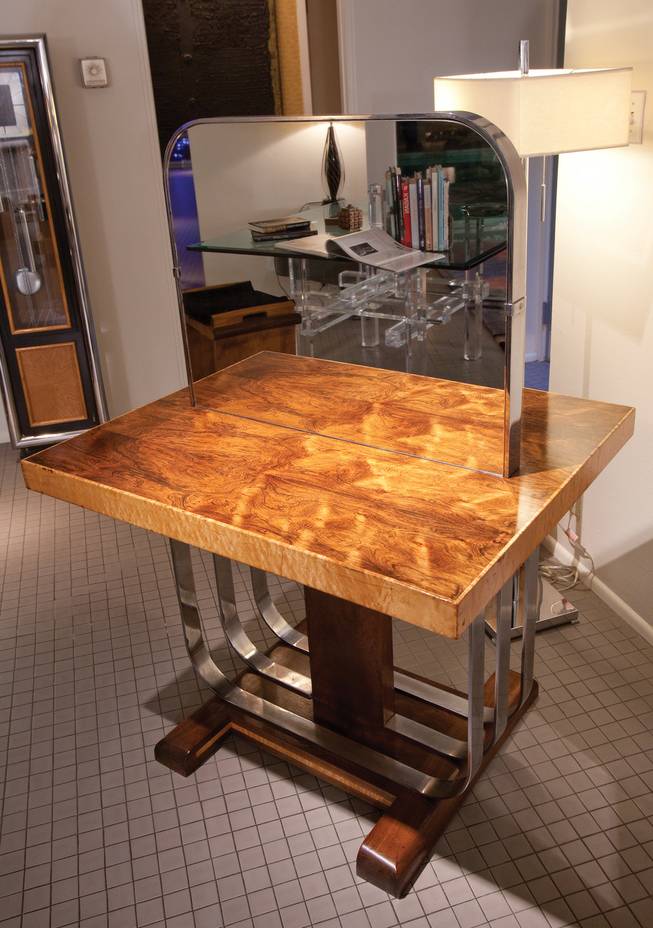 An art deco table once used in a milliner store is in the home of Steve Evans.