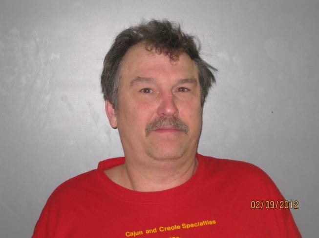 Nye County sheriff's deputies arrested Todd Kitchner, who is accused of shooting at a neighbor's home in Pahrump on Feb. 9, 2012.