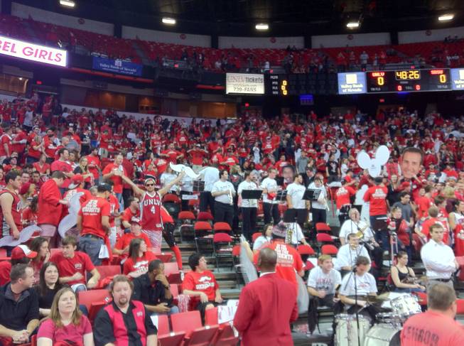 The student section at the UNLV-San Diego State game. There are a million stories up there ... and a dozen big heads.