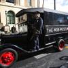 Members of the San Diego Police Museum Association arrive in a 1932 "paddy wagon" during the grand opening of The Mob Museum in Las Vegas, Tuesday February 14, 2012. The museum, in a former federal courthouse and post office, is one of 14 sites in the nation that hosted the 1950-51 U.S. Senate Special Committees to investigate Crime in Interstate Commerce, also known as the Kefauver hearings.