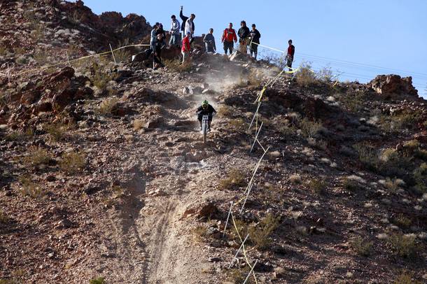 A rider competes in the Downhill at Reaper Madness at Bootleg Canyon in Boulder City on Sunday, Feb. 19, 2012.