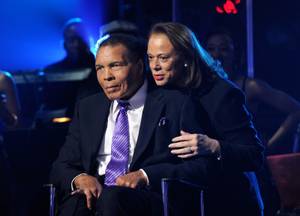 Boxing legend Muhammad Ali and his wife Lonnie Ali appear onstage during Keep Memory Alive's "Power of Love Gala" celebrating Muhammad Ali's 70th birthday at MGM Grand Garden Arena on Saturday, Feb. 18, 2012. The event benefits the Cleveland Clinic Lou Ruvo Center for Brain Health and the Muhammad Ali Center. 