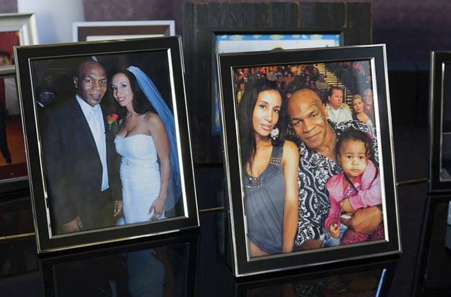 Family photos are displayed at Mike Tyson's home in Henderson Friday, Feb. 24, 2012. Tyson will star in "Mike Tyson: Undisputed Truth - Live on Stage," a one-man show on the Strip. Tyson's wife Lakiha, who goes by Kiki, and Randy Johnson wrote the show.