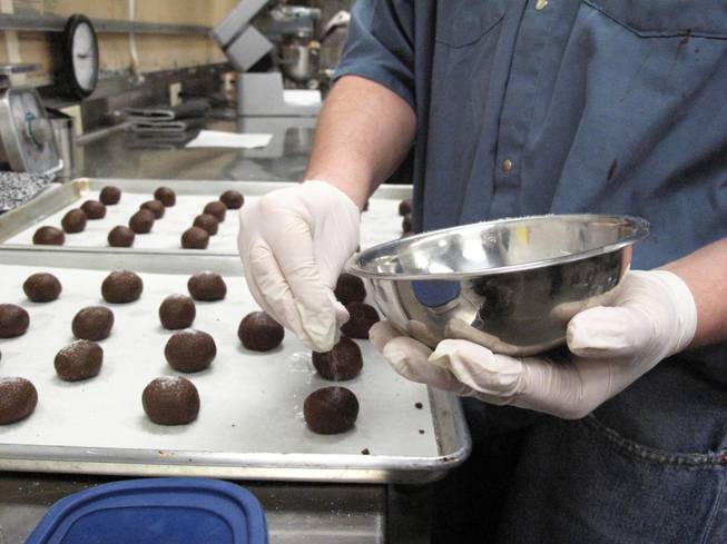 A culinary student at the High Desert State Prison prepares a chocolate dessert on Friday, Feb. 24, 2012. More than 300 inmates at the Indian Springs prison receive adult education and vocational training from the Clark County School District through a partnership with the Nevada Department of Corrections. 