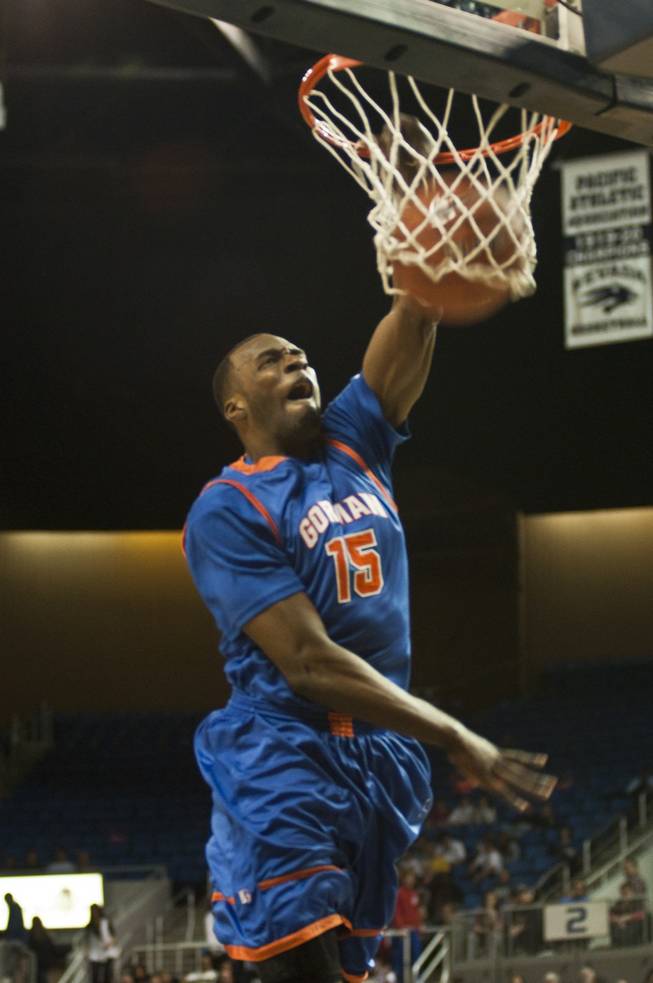Bishop Gorman High's Shabazz Muhammad soars to the hoop for an uncontested dunk during the Gaels' 96-51 win over Northern Nevada's Hug High in the state championship game at Lawlor Events Center in Reno.