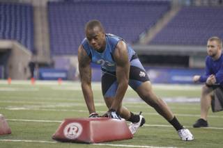 Nevada linebacker Brandon Marshall runs a drill at the NFL football scouting combine in Indianapolis, Monday, Feb. 27, 2012. 