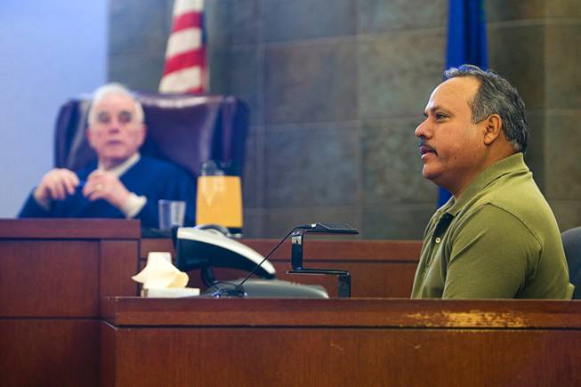 Judge William Jansen listens as security officer Oscar Velasquez testifies during a preliminary hearing in District Court Tuesday Feb. 28, 2012. Benjamin Gerard Hawkins, a Gainesville, Fla., teacher who was on vacation, is facing charges of involuntary manslaughter in connection with the death of another tourist after an altercation at O'Sheas in July.