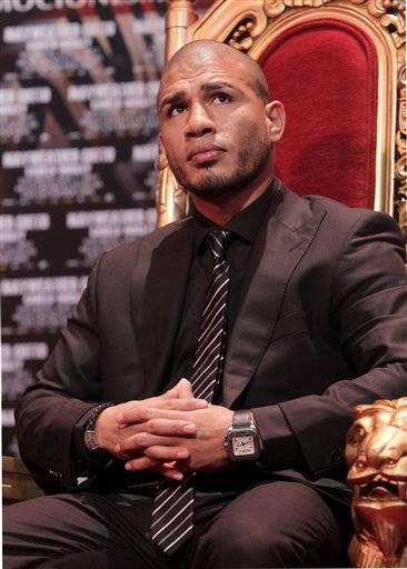 Boxer Miguel Cotto participates in a news conference in New York, Tuesday, Feb. 28, 2012. Cotto and Floyd Mayweather will fight in Las Vegas on May 5, 2012.
