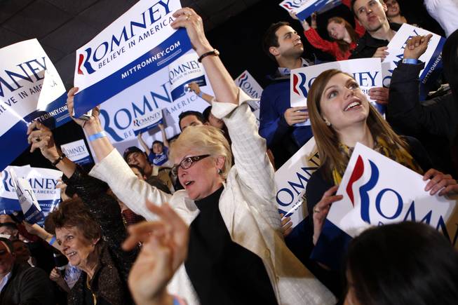 Supporters cheer as election results come in at the Super Tuesday primary watch party for Republican presidential candidate Mitt Romney in Bosto on March 6, 2012. 