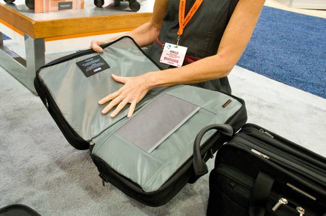 Laptop cases and backpacks by Briggs & Riley Travel Ware are on display at the 2012 Travel Goods Show in Las Vegas, Thursday March 8, 2012.