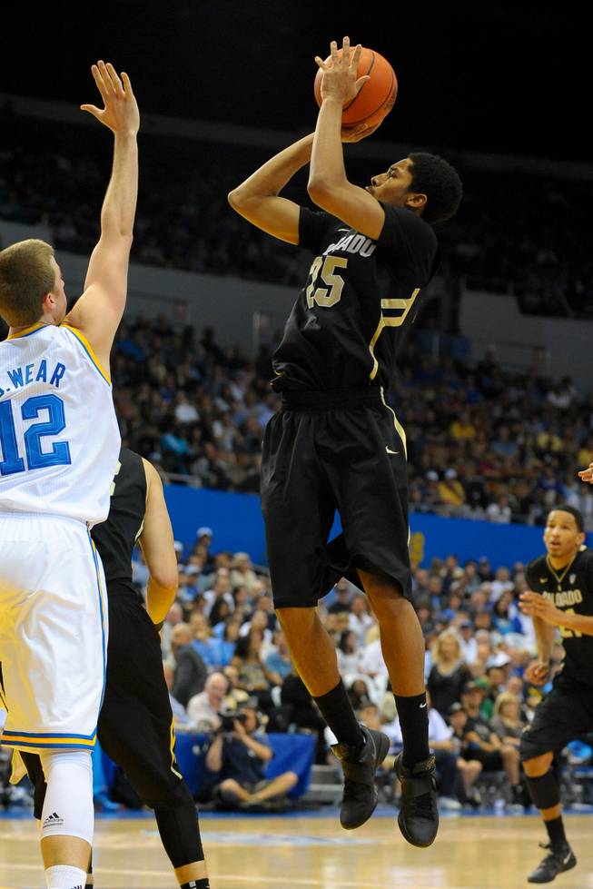 Colorado freshman guard Spencer Dinwiddie, a high school teammates of UNLV's Justin Hawkins, attempts a shot earlier during the 2012 season against UCLA. UNLV and Colorado will play during the 2012 NCAA Tournament, pitting the former Taft High of Southern California players against each other.