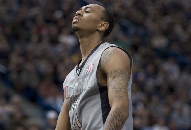 Connecticut's Ryan Boatright reacts in the second half of an NCAA college basketball game against Notre Dame in Hartford, Conn., Sunday, Jan. 29, 2012.