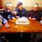 Photo: Pearl Harbor survivors pose for photos with a cake